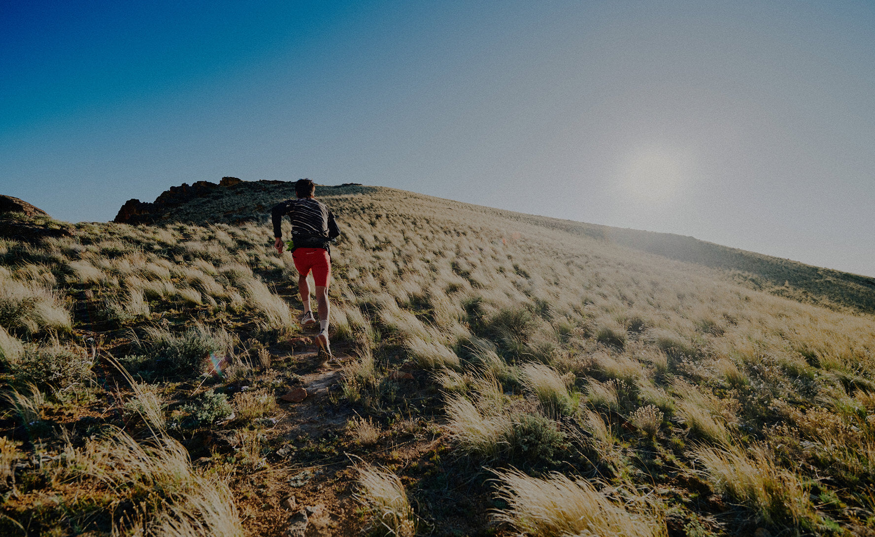 Men's Seek Trail Running Shoe  |  Black/Sunset Sand